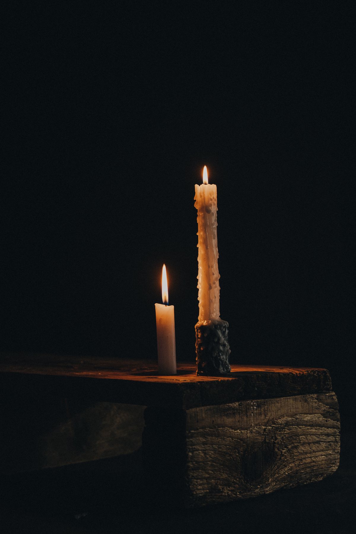 A lit remembrance candle honoring a loved one